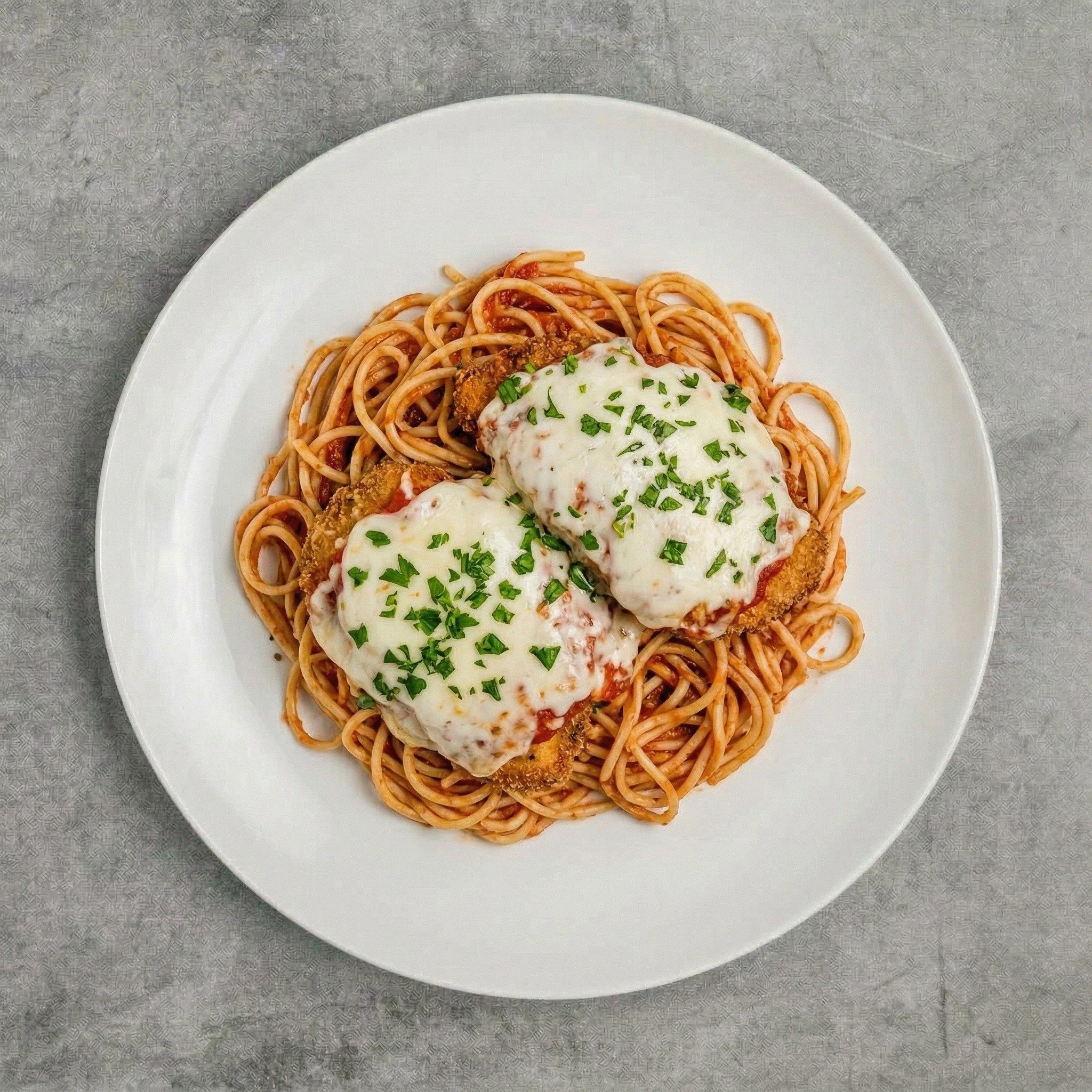 Chicken Parmigiana with Spaghetti.